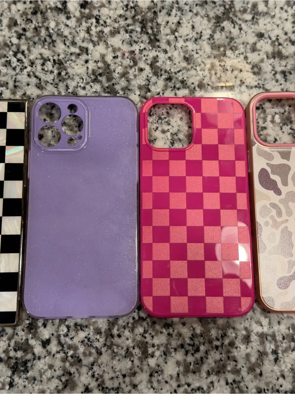 Multiple iPhone 13 Pro Max cases pop sockets etc